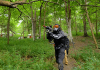 Player In Woodsball Field